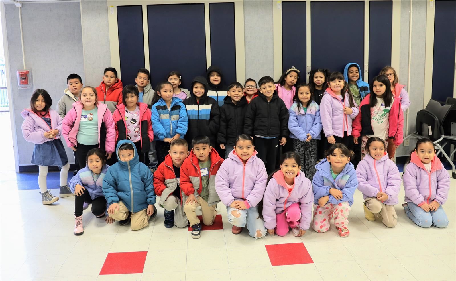 Valencia park students in free coats